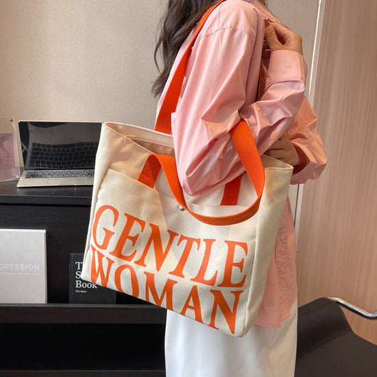 Large Letter Printed Canvas Shoulder Bag orange color Prints & Handle