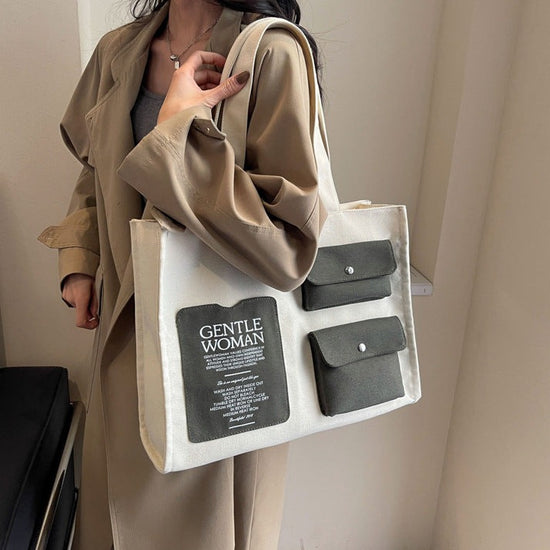 off-White Multi-Pocket Large Canvas Bag with green pockets