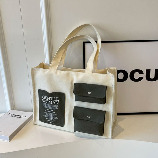 off-White Multi-Pocket Large Canvas Bag with green pockets